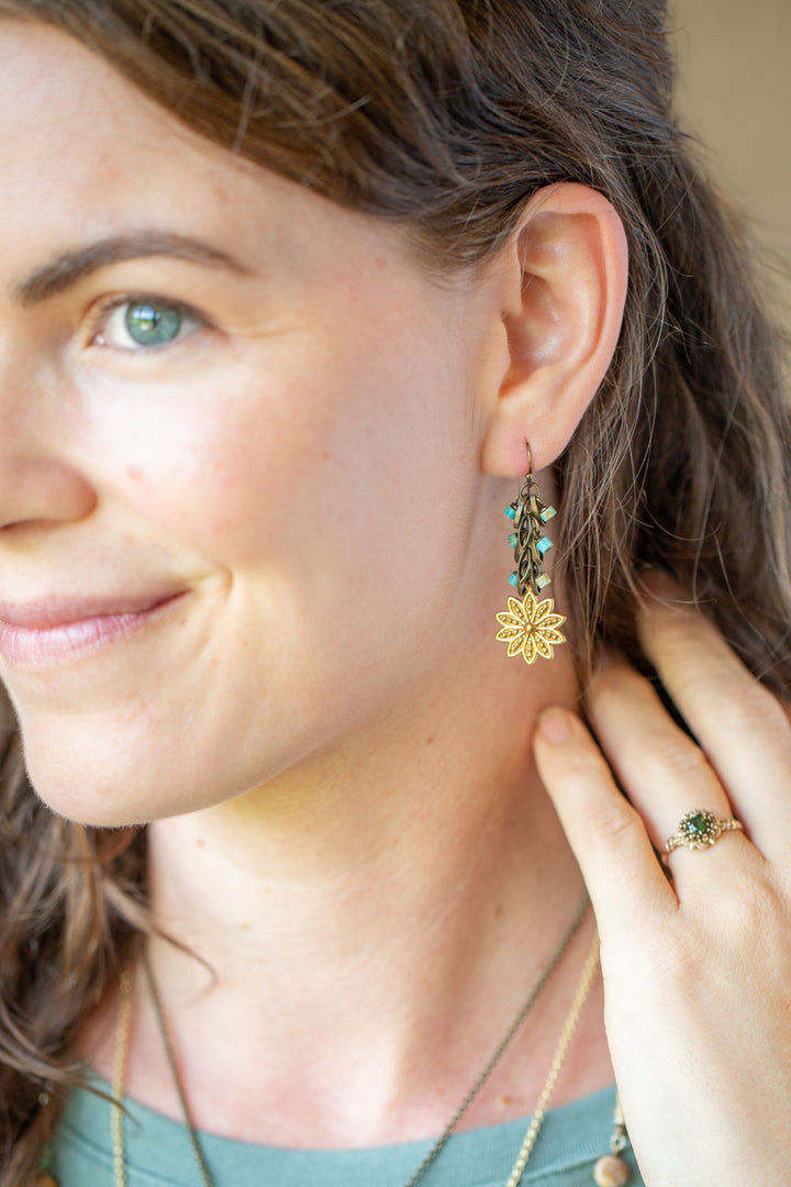 Enlighten Turquoise Chip With Brass Flower Dangle Earrings