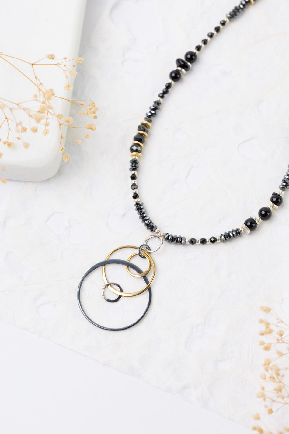 Nightfall 23-25" Black Onyx With Mixed Metal Circles Statement Necklace